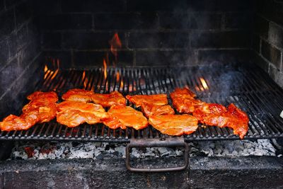 Close-up of meat on barbecue grill