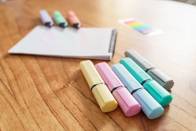 High angle view of multi colored pencils on table