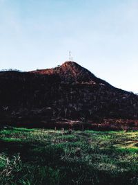 Scenic view of land against clear sky