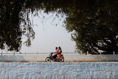 People riding bicycle