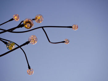 Low angle view of street light against sky