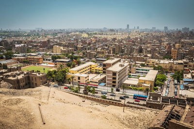 Scenic view of town against clear sky