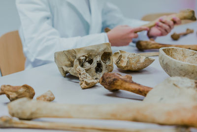 Close-up of man preparing food