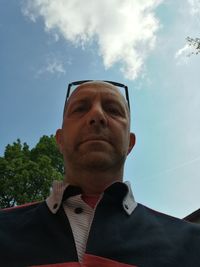 Portrait of man against sky