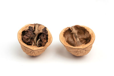 Close-up of dried fruits against white background