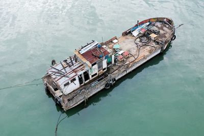 High angle view of boat floating on sea