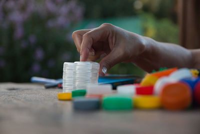 Hand holding plastic recycle concept