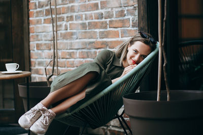 Young beautiful woman with long hair enjoying springtime.