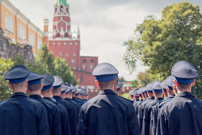 Rear view of people in uniform