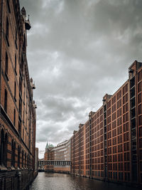 Buildings in city against sky