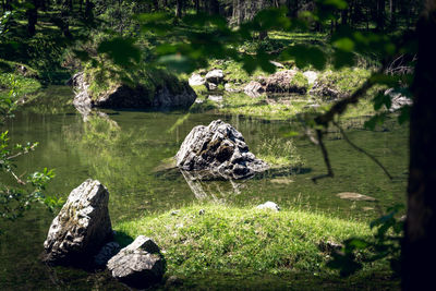 Scenic view of rocks in lake