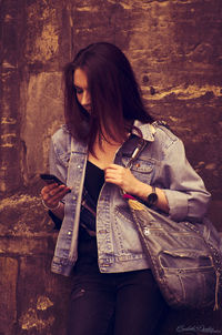 Young woman using smart phone