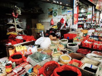 Woman at market stall