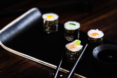 Close-up of sushi served on table