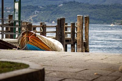 Wooden pier over sea against sky