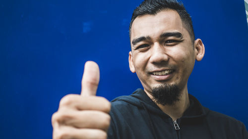 Portrait of young man smiling