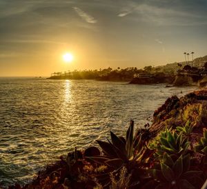Scenic view of sea against sky during sunset