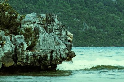 Scenic view of rock formation in sea