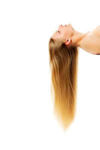 Portrait of woman against white background