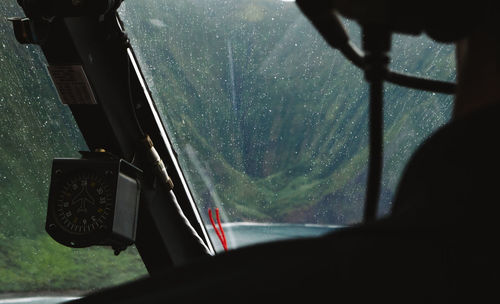 Helicopter flying over mountain