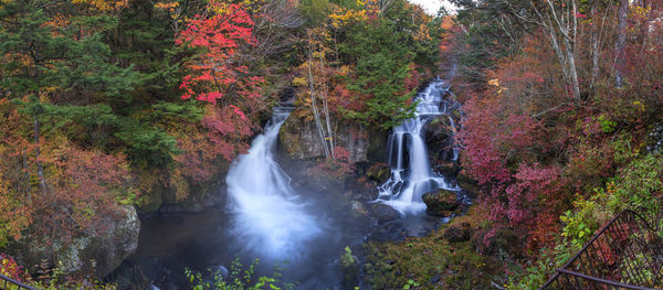 Waterfall in forest during autumn