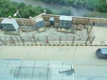 High angle view of swimming pool by building