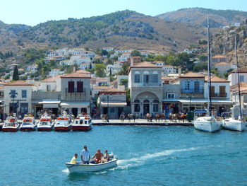 People on boat sailing in sea