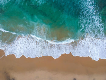 Close-up of water splashing in sea