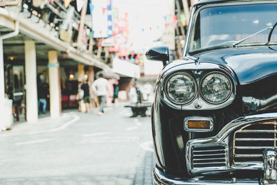 Vintage car on street in city