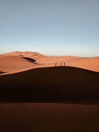 Scenic view of desert against clear sky