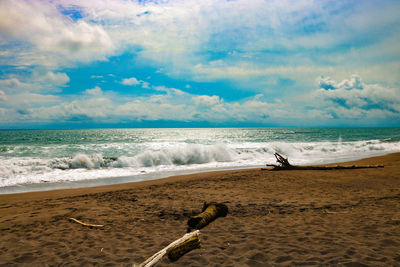 Scenic view of beach against sky