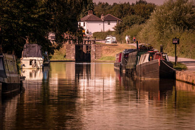 Boats moored in canal