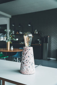 Close-up of glass jar on table at home