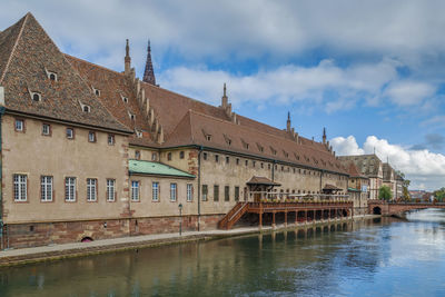 Building against cloudy sky