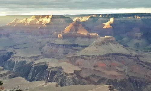 Aerial view of rock formations against sky