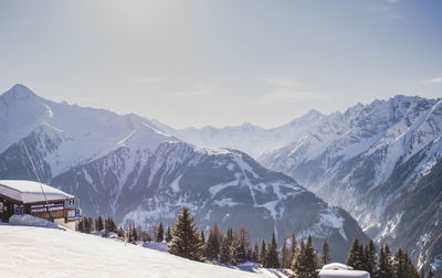 Scenic view of mountains against sky during winter