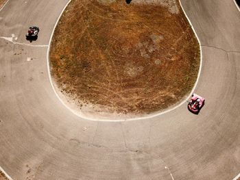 High angle view of land vehicles on road