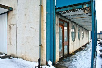 Snow covered built structure during winter