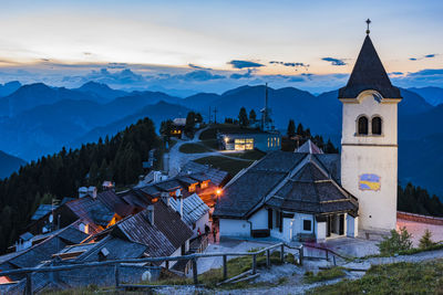 Houses and buildings against sky