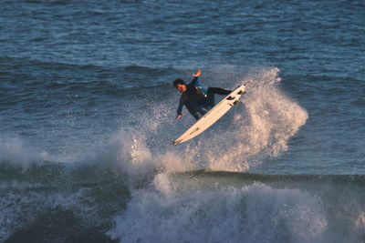 Man surfing in sea