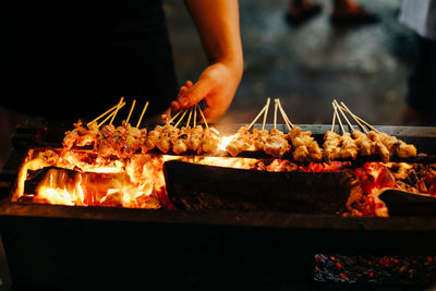 Close-up of meat on barbecue grill