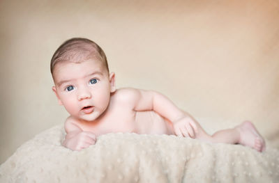 Portrait of cute baby lying down