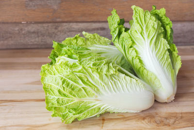 Close-up of green leaf on table