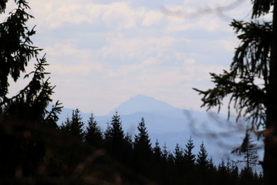 Scenic view of silhouette mountains against sky