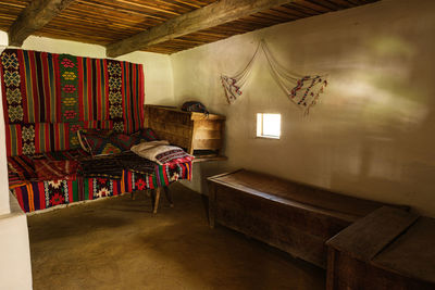 Traditional romanian folk house interior with rural furniture and decoration