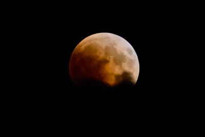 Scenic view of moon against sky at night