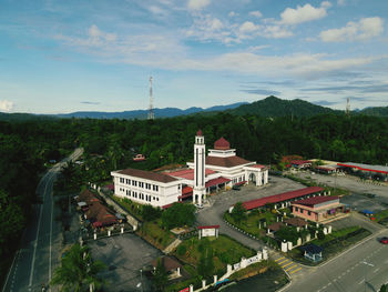 High angle view of buildings in city against sky