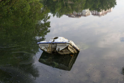 A abandoned jet ski in the lake