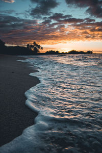 Scenic view of sea against sky during sunset