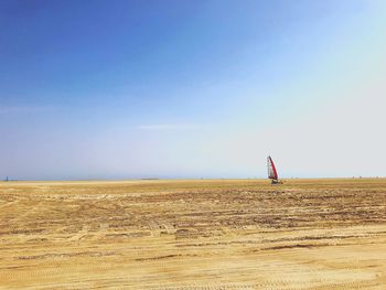 Scenic view of beach against clear sky